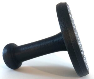 Black ball bearing baren with tall handle on its side